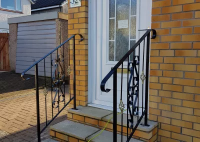 Decorative iron front step handrails Ardrossan